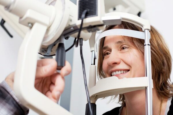 Woman getting an eye exam